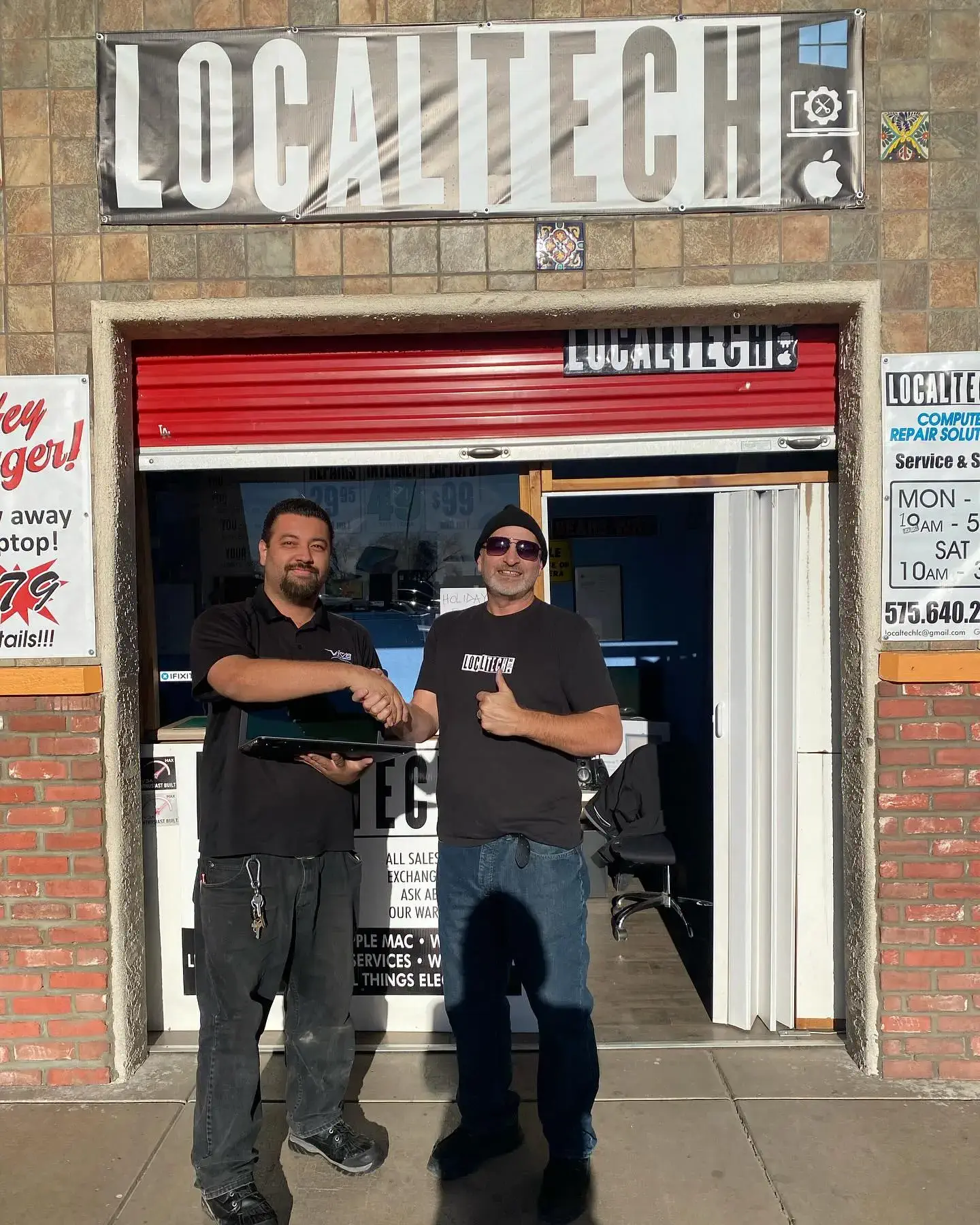 Owner (Albert) Handshaking a customer after finishing a computer repair